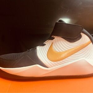 Nike Team Hustle Black and Metallic Gold Sneakers